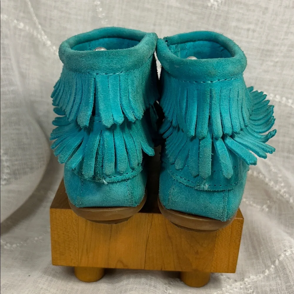 Minnetonka leather fringe moccasins with side zipper